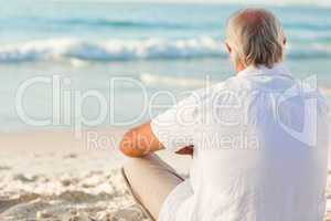 Man sitting on the beach