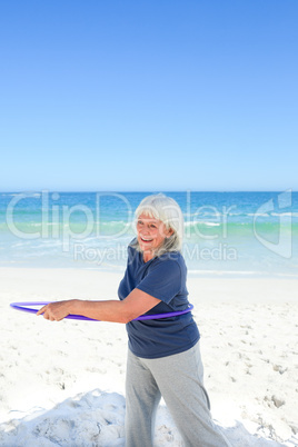 Senior woman playing with her hoop