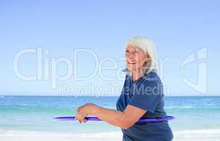 Senior woman playing with her hoop