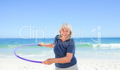 Senior woman playing with her hoop