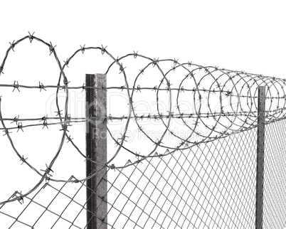 Chainlink fence with barbed wire on top closeup