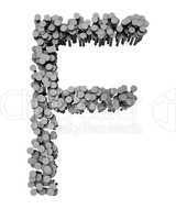 Alphabet made from hammered nails, letter F