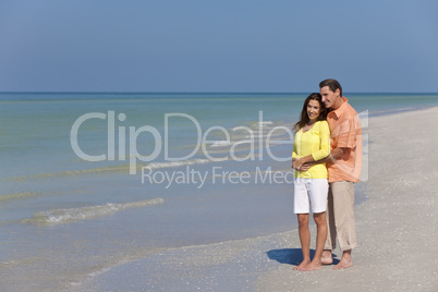 Happy, Man and Woman Couple Embracing on An Empty Beach