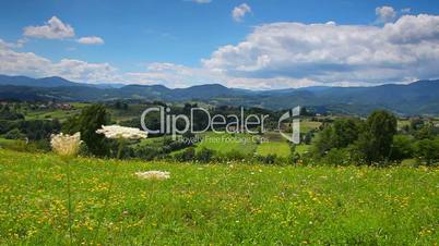 Sky clouds and hills meadow