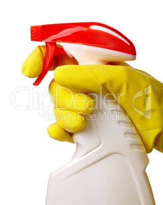 Hand holds sprayer with chemical cleaner