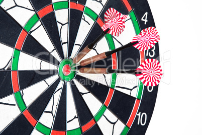 Darts board with arrows