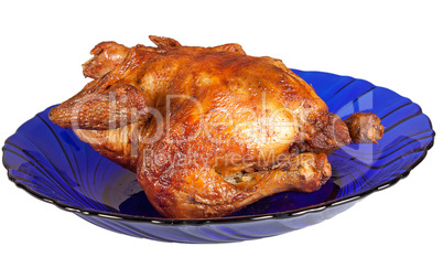 Roasted hen on blue dish