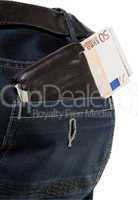 Wallet with euro in jeans pocket