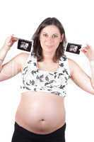 Young woman holding a sonogram of her child