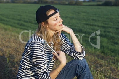 Young Blond Woman With Her Broken Car