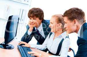 Three young successful businesspeople. Screen has a clipping pat
