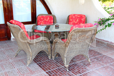 wicker chair and table outdoors
