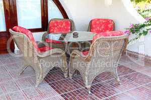 wicker chair and table outdoors