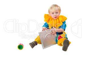 Child holding laptop