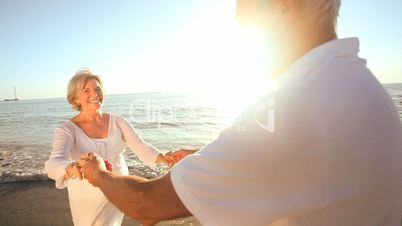 Seniors Romantic Beach Dancing