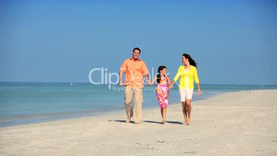 Happy Young Family on the Beach