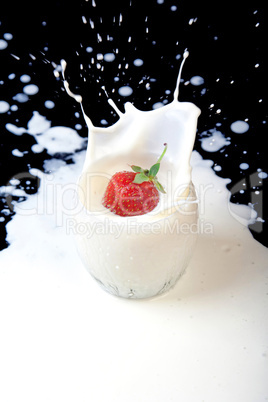Strawberry in milk splash