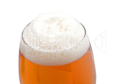 Top of the glass with beer foam