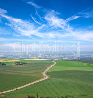 clouds, blue sky and green meadows