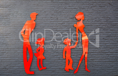 People silhouettes on wall