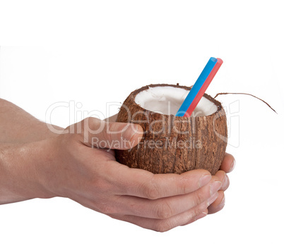 Half open coconut in male hands