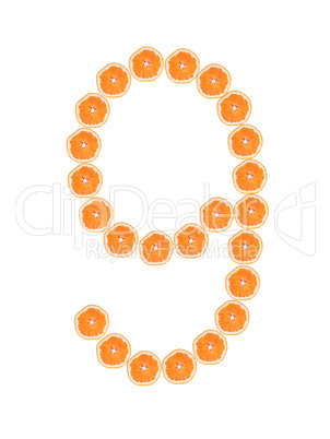 Number "9" from orange slices isolated on white