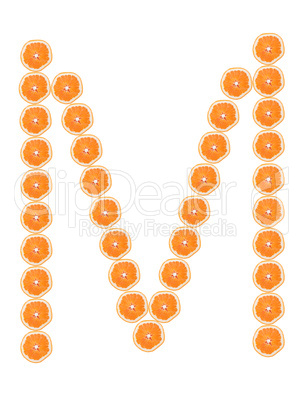 Letter "M" from orange slices isolated on white