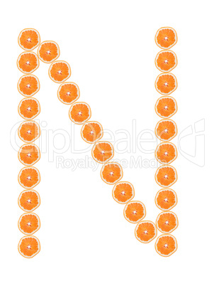 Letter "N" from orange slices isolated on white