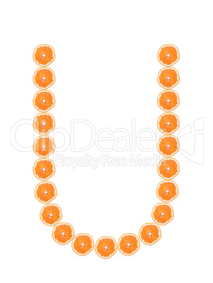 Letter "U" from orange slices isolated on white