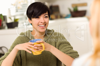 Multi-ethnic Young Attractive Woman Socializing with Friend