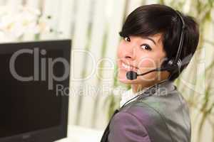 Attractive Young Woman Smiles Wearing Headset