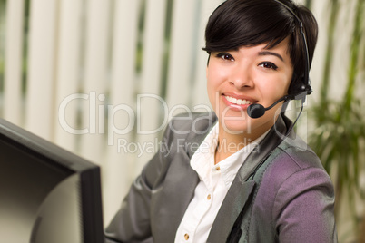 Attractive Young Woman Smiles Wearing Headset