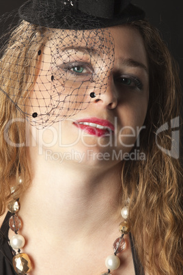 Young woman portrait in cabaret dress