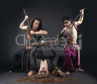 Man with spike, woman with shield - ritual scene