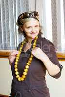 Woman with amber beads