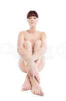 Beauty niked woman sit on white