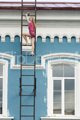 Young woman on stair