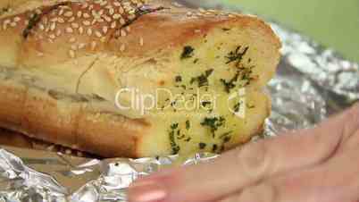 Unwrapping Garlic Bread