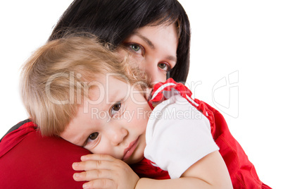 Mother holding crying baby