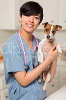Smiling Attractive Mixed Race Veterinarian Doctor or Nurse with