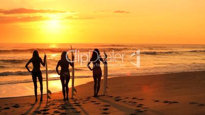 Surfer Girls at Sunrise