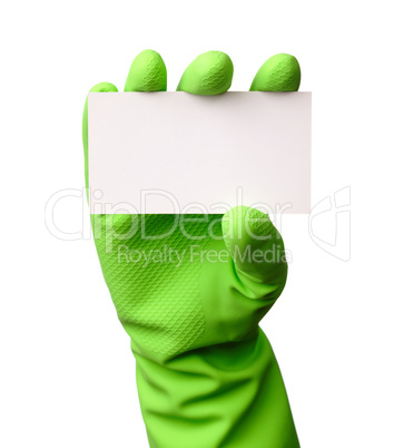 Hand in green glove showing business card