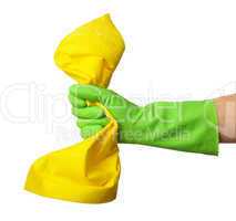 Hand in rubber glove holds cleaning rag