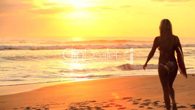 Surfer Girl at Sunrise