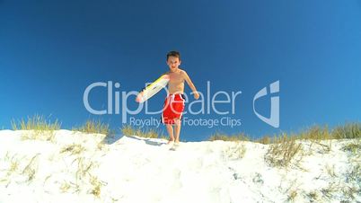 Young Boy With Bodyboard