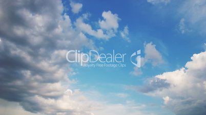 Rotated white clouds floating on blue sky - motion background