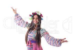 young girl with garland dance in russian costume