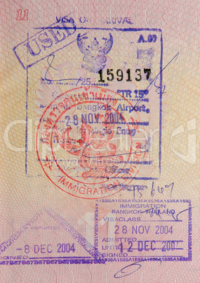 passport with thai visa and stamps