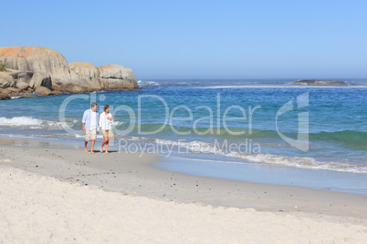 Couple walking on the beach