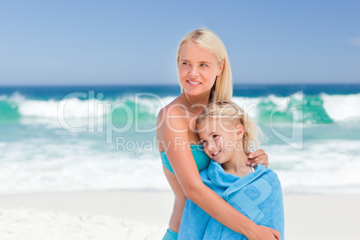 Mother with her daughter in her towel